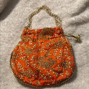 Orange punjabi polki bag. Gorgeous addition to any outfit